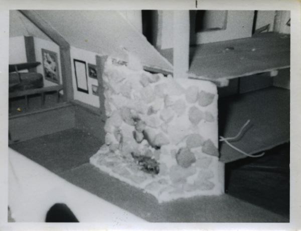 Here Brad builds a model of his dream studio with fireplace and grand piano in it at the age of 13.