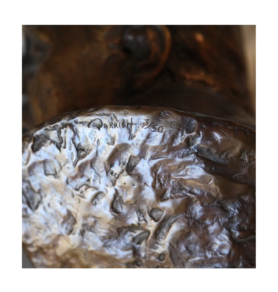 Above: This photo shows a detail under the shoulder of someone in the foundry who has carved the artist number into this piece along with the number of the piece and how many pieces are in the edition. In this case, this is the number 3 piece in the total edition of 50 to be made in the edition.