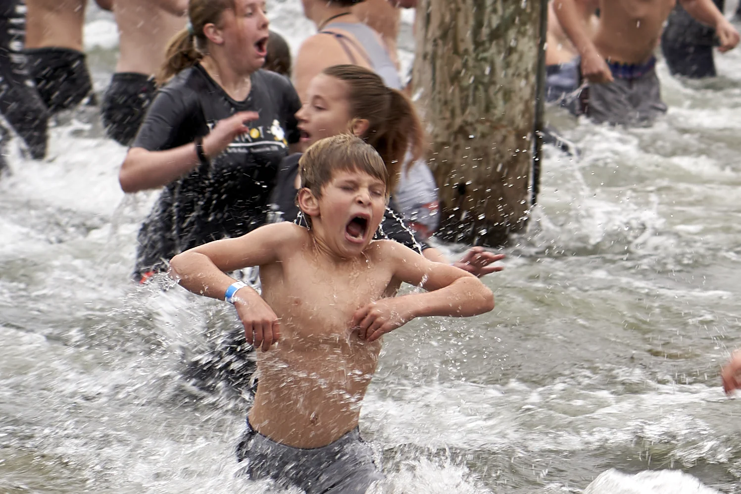 The icy-cold water did not hinder participants from taking The Polar Plunge into Klineline Pond after the race. Nearly 100 turkey trotter, young and old, braved the waters.