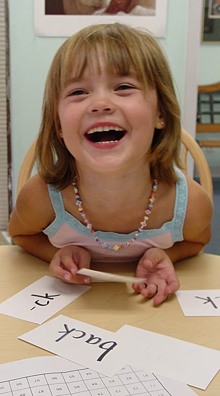 Emily learned to read joyously at four years old.