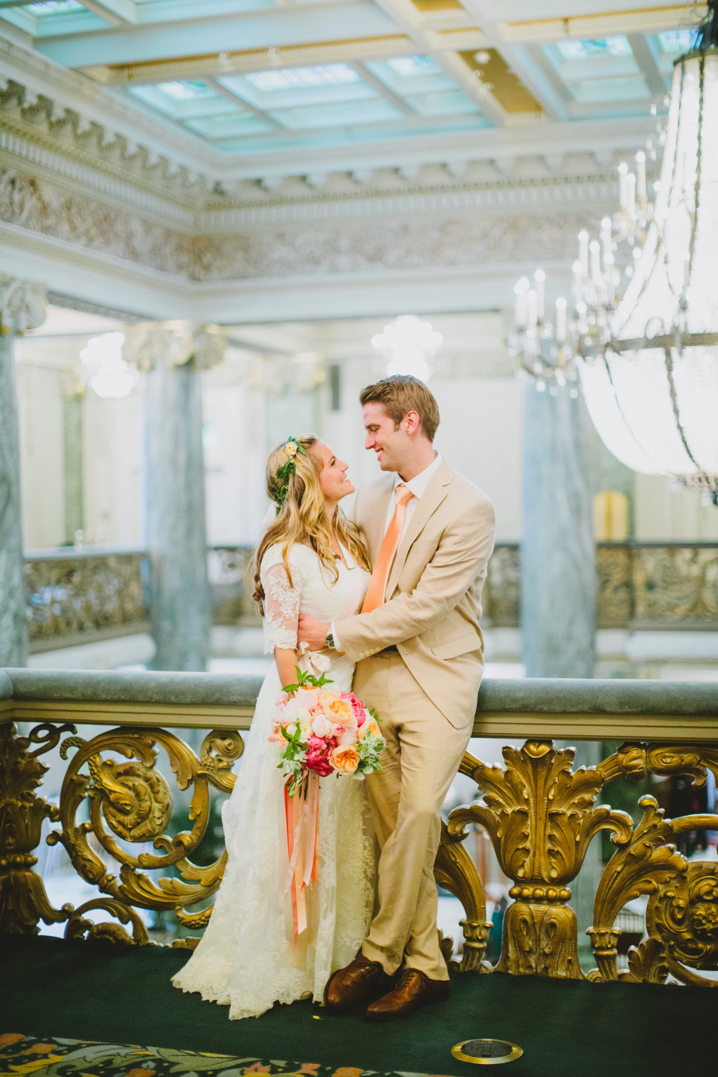 Lauren + Mack were such a lovely bride & groom to work with. The color palate consisted of all shades of ivory, cream, peach, and coral with touches of vibrant greenery. Lauren mentioned she had a love of Coral Charm peonies, so we didn't hesitate to make sure every centerpiece had some of the seasonal beauties. Plus, the wedding was in June, again the perfect month for any peony lover! The day of Lauren & Mack's wedding was a complete downpour of early Summer rain. Lauren was such a trooper and didn't even bat an eyelash at the rain. In fact, she embraced it and it made for some of our favorite photos! Enjoy Lauren & Mack's wedding photos, from the Salt Lake City LDS Temple grounds, to the Beehive House across the street and a reception to follow at This is the Place Park. Thanks Lauren & Mack for choosing Lilac Floral as your wedding florist! Photos courtesy of Michael Rowley Photography