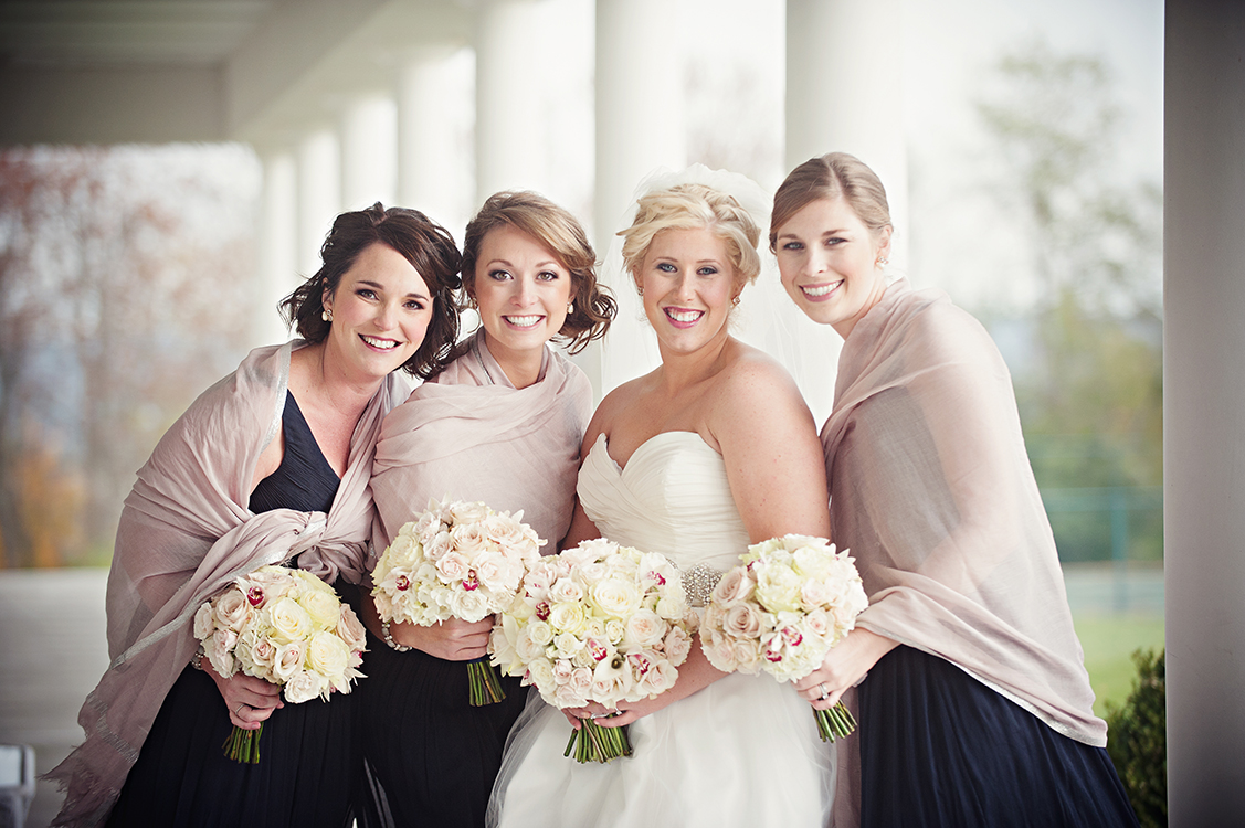  Bouquets with white hydrangea, white mini callas, Snow Flake spray roses, white mini cymbidium orchids, Mondial roses, White O’Hara garden roses, Porcelina spray roses and White Majolica spray roses. Flowers by Cincinnati wedding florist Floral Verd