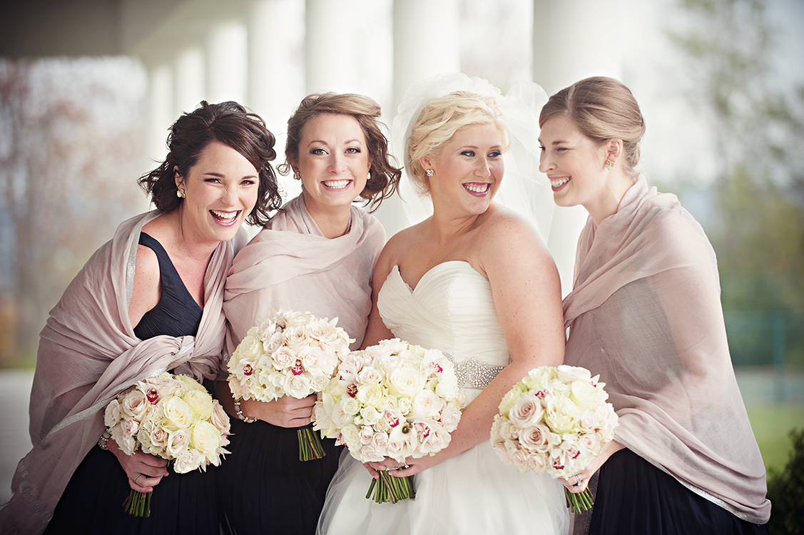  Bouquets with white hydrangea, white mini callas, Snow Flake spray roses, white mini cymbidium orchids, Mondial roses, White O’Hara garden roses, Porcelina spray roses and White Majolica spray roses. Flowers by Cincinnati wedding florist Floral Verd