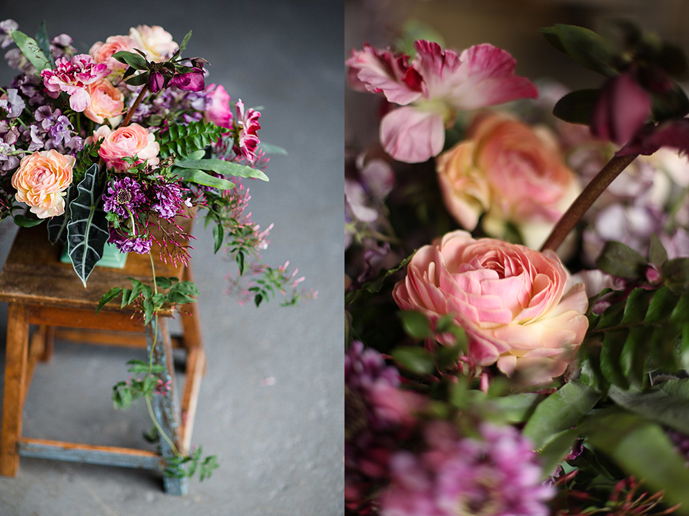  Overflowing centerpiece with purple Japanese scabiosa, purple hellebores, Silvery Moon Japanese sweet pea, Charlotte ranunculus, peach ranunculus, jasmine vine, blue star fern and Alocasia ‘Polly’, in a vintage mint footed bowl. Images by&nbsp; Leah