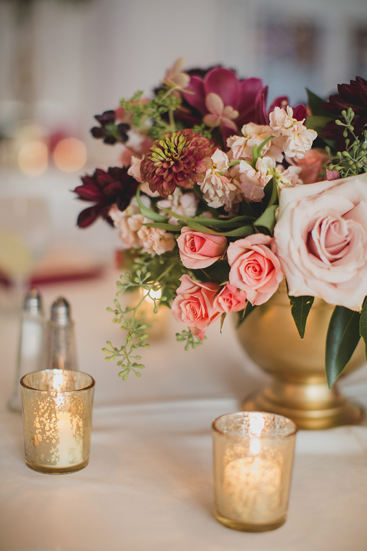Centerpiece at wedding reception at Pinecroft Mansion, Cincinnati, Ohio. Flowers by Floral Verde LLC. Photo by Carly Short Photography.