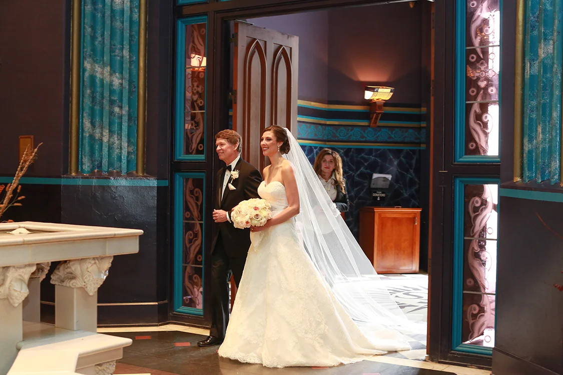 Wedding Ceremony at St. Francis Xavier Church, Cincinnati, Ohio. Flowers by Floral Verde LLC. Photo by Sherri Barber.