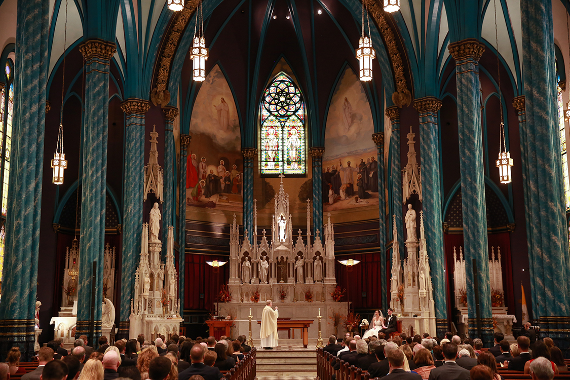 Wedding Ceremony at St. Francis Xavier Church, Cincinnati, Ohio. Flowers by Floral Verde LLC. Photo by Sherri Barber.