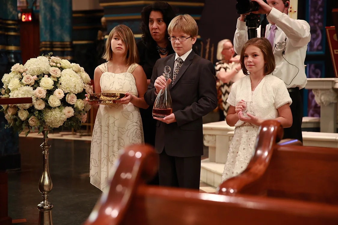 Wedding Ceremony at St. Francis Xavier Church, Cincinnati, Ohio. Flowers by Floral Verde LLC. Photo by Sherri Barber.
