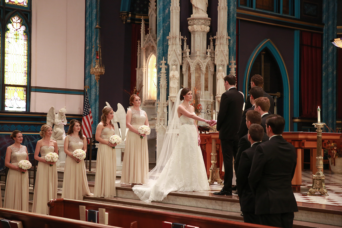 Wedding Ceremony at St. Francis Xavier Church, Cincinnati, Ohio. Flowers by Floral Verde LLC. Photo by Sherri Barber.