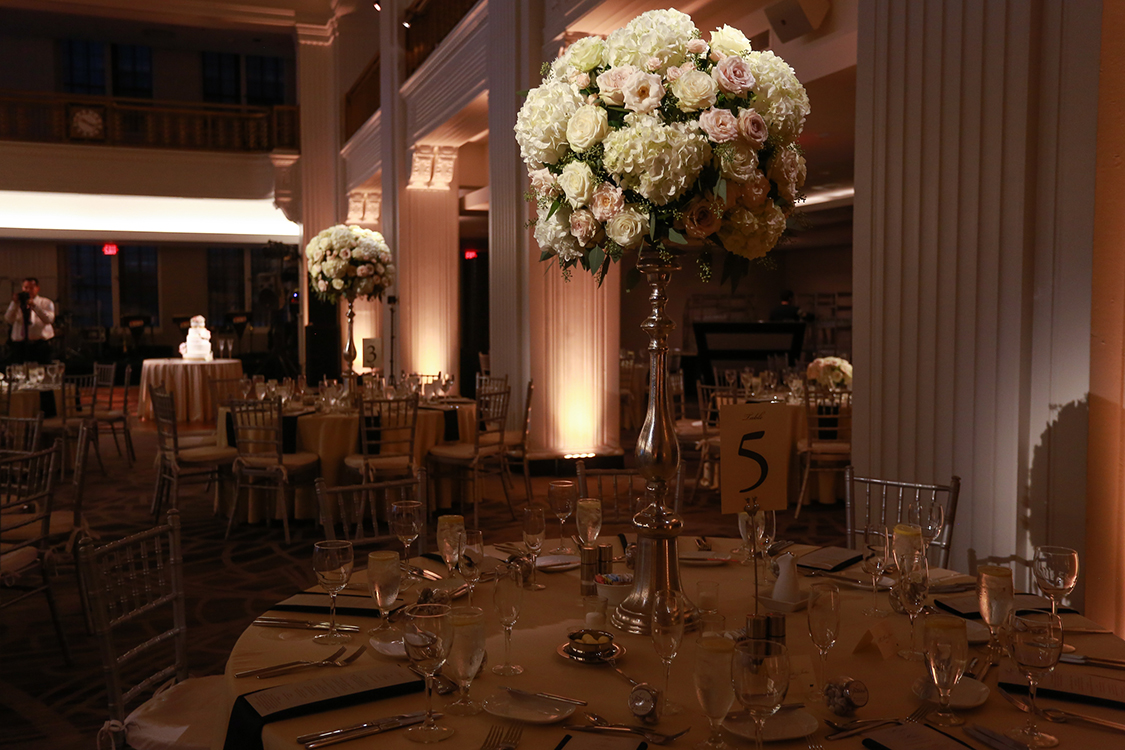 Wedding Reception with tall centerpieces at The Renaissance, Cincinnati, Ohio. Flowers by Floral Verde LLC. Photo by Sherri Barber.