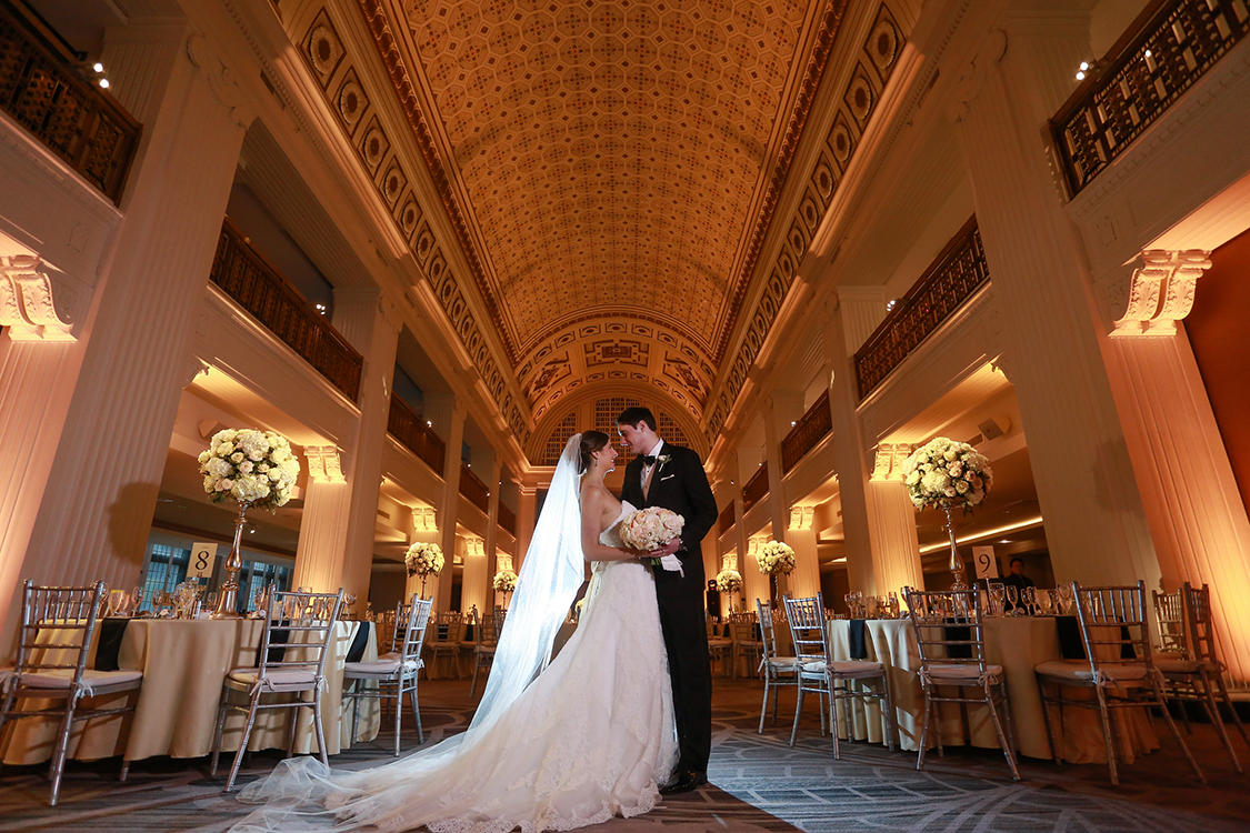 Wedding Reception with tall centerpieces at The Renaissance, Cincinnati, Ohio. Flowers by Floral Verde LLC. Photo by Sherri Barber.