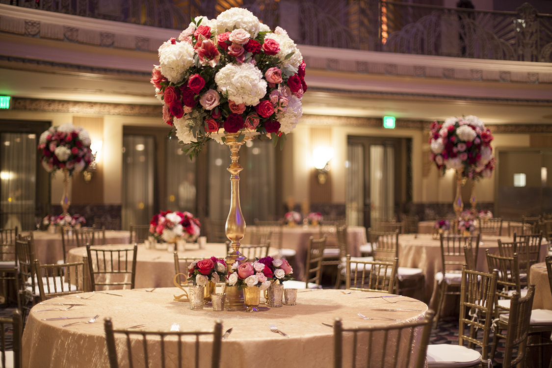 Wedding Reception in the Hall of Mirrors at the Hilton Netherland Plaza Hotel in Cincinnati, Ohio. Flowers by Floral Verde.