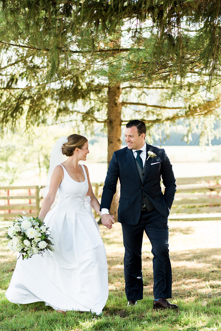 Wedding Ceremony at a Private Farm in Hillsboro, Ohio. Flowers by Floral Verde. Photo by Lane Baldwin Photography.