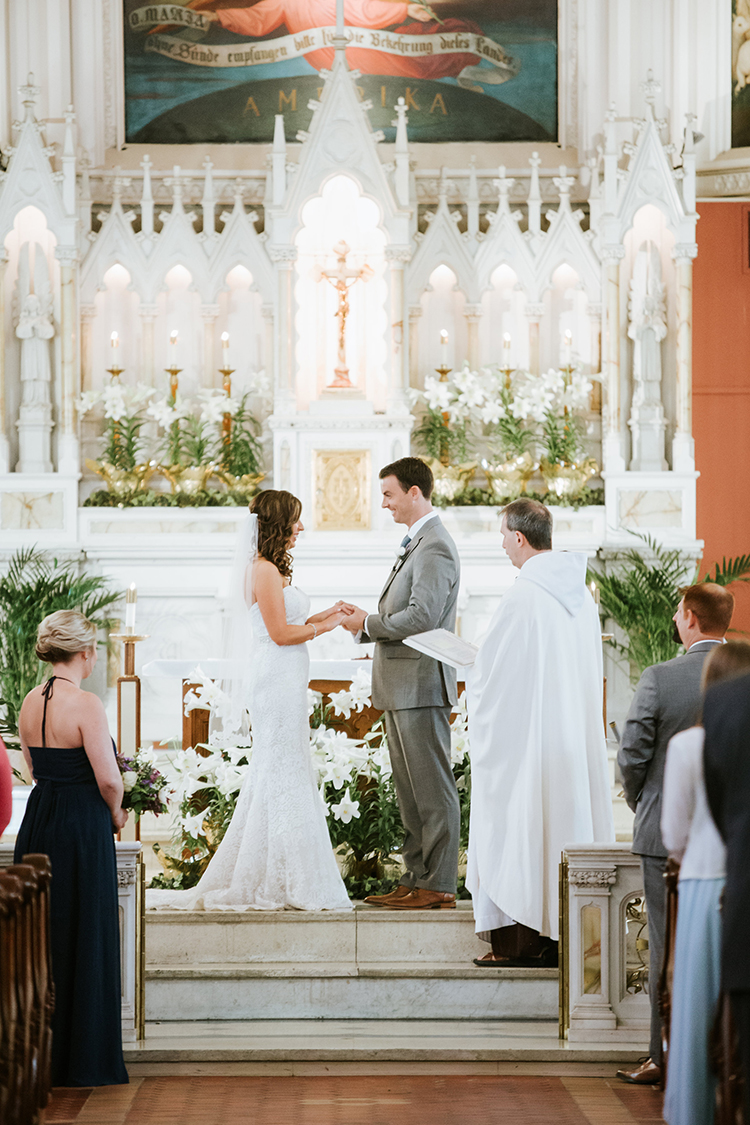 Wedding Ceremony at Holy Cross Immaculata in Cincinnati, Ohio. Flowers by Floral Verde. Photo by Eleven:11 Photography.