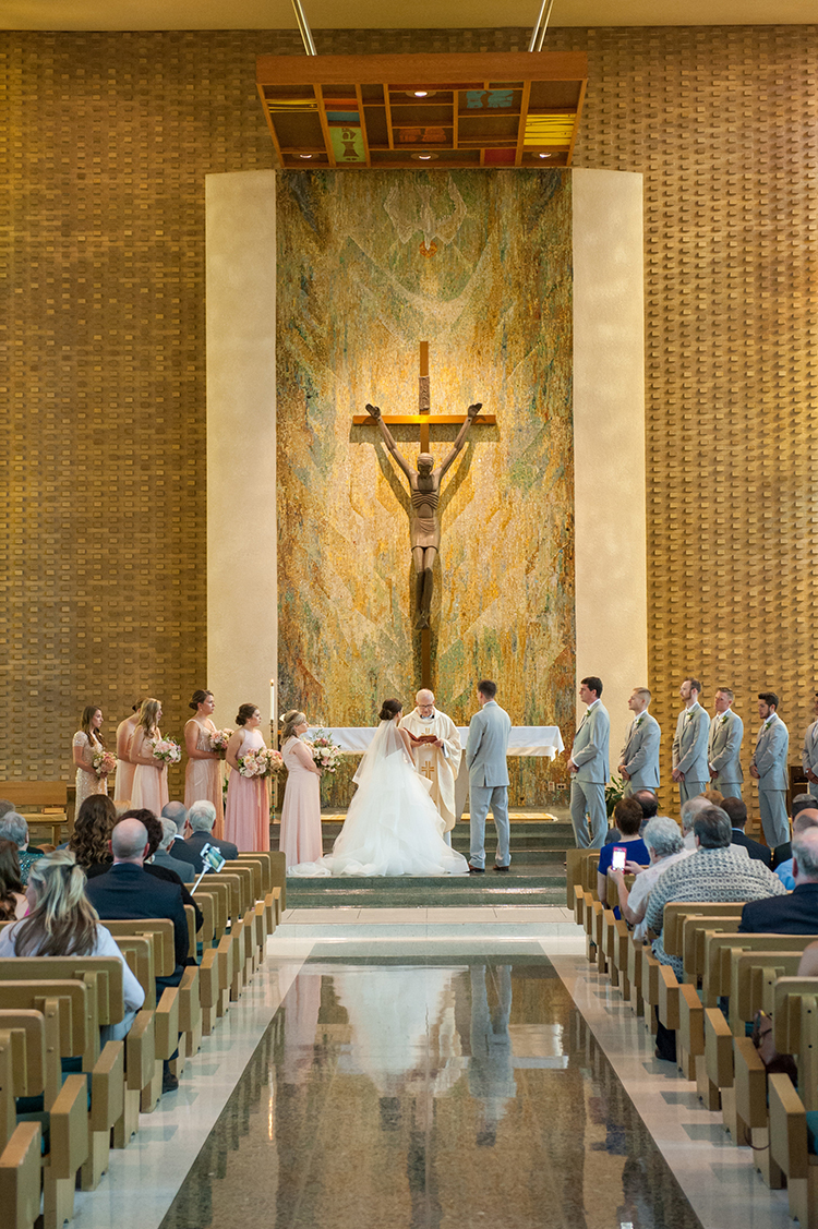 Wedding Ceremony at Mount Saint Joseph University Mater Dei Chapel in Cincinnati, Ohio. Flowers by Floral Verde. Photo by Ben Elsass Photography.
