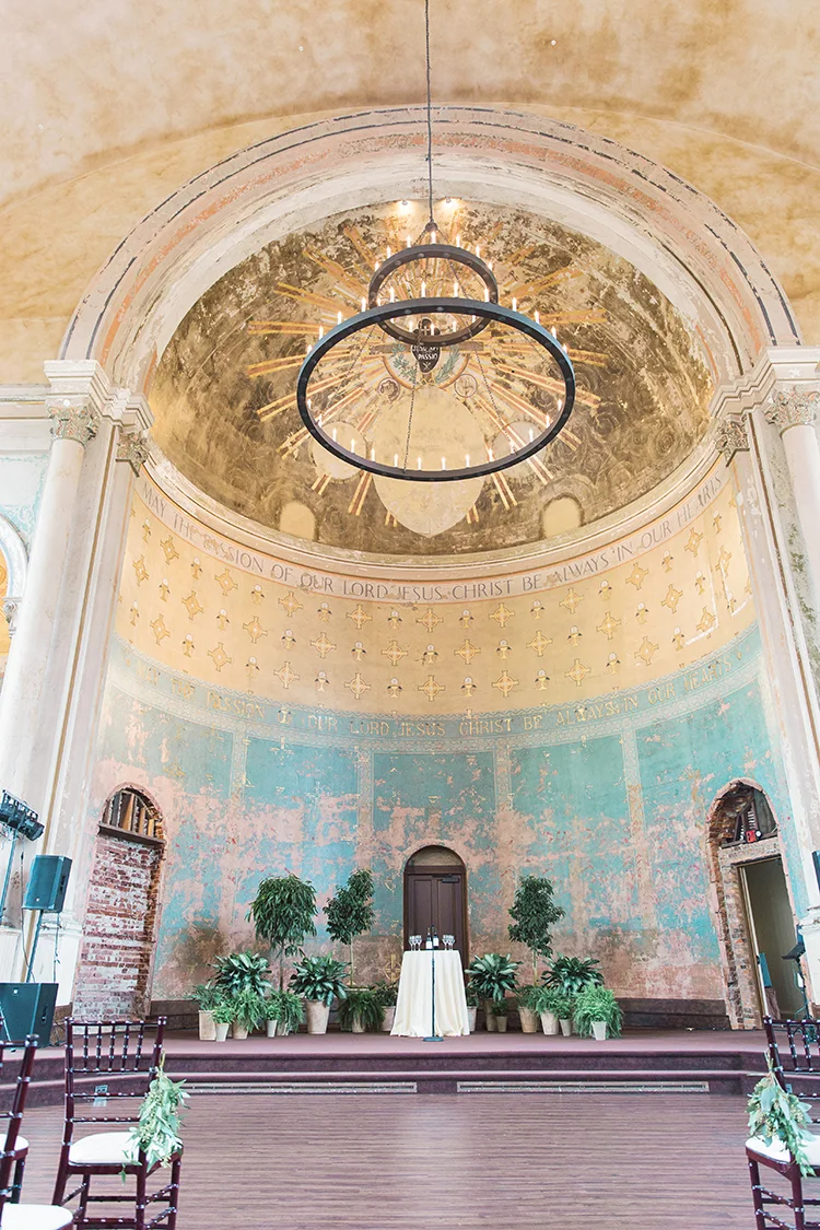 Wedding Ceremony at The Monastery Event Center in Cincinnati, Ohio. Flowers by Floral Verde. Photo by Amanda Donaho Photography.