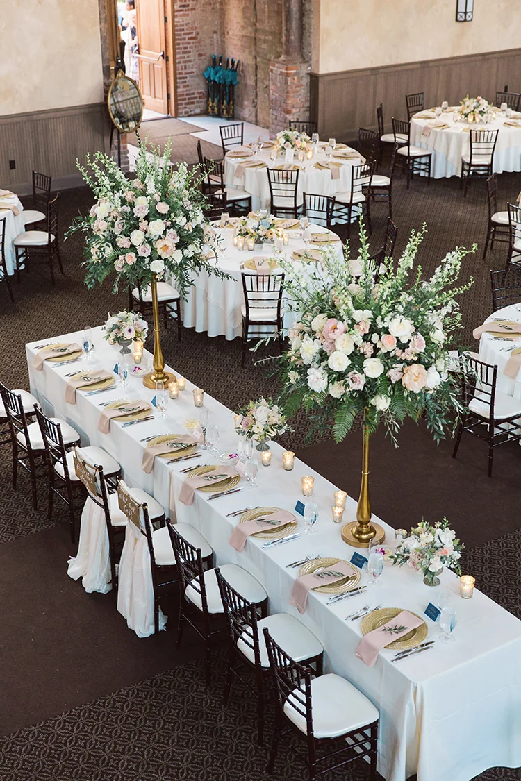 Wedding Reception at at The Monastery Event Center in Cincinnati, Ohio. Flowers by Floral Verde. Photo by Amanda Donaho Photography.