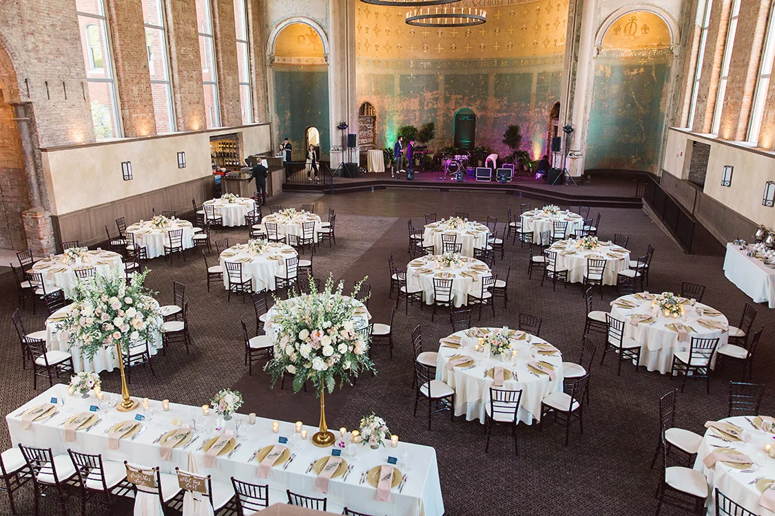 Wedding Reception at at The Monastery Event Center in Cincinnati, Ohio. Flowers by Floral Verde. Photo by Amanda Donaho Photography.