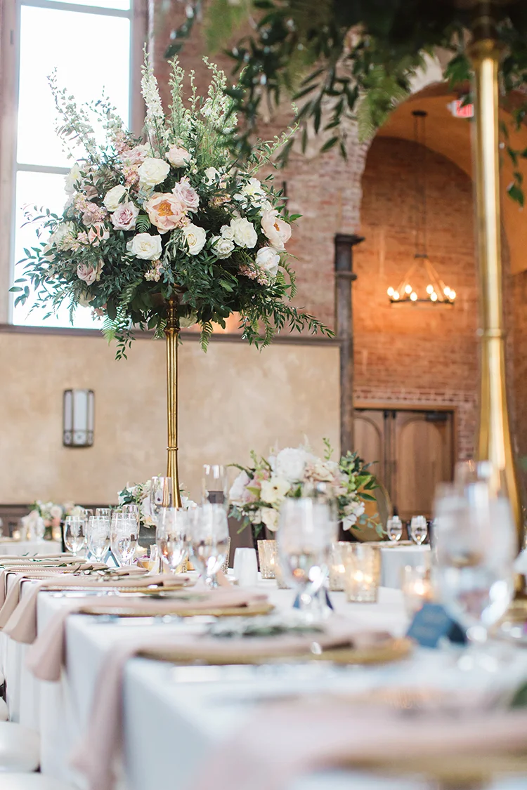 Wedding Reception at at The Monastery Event Center in Cincinnati, Ohio. Flowers by Floral Verde. Photo by Amanda Donaho Photography.