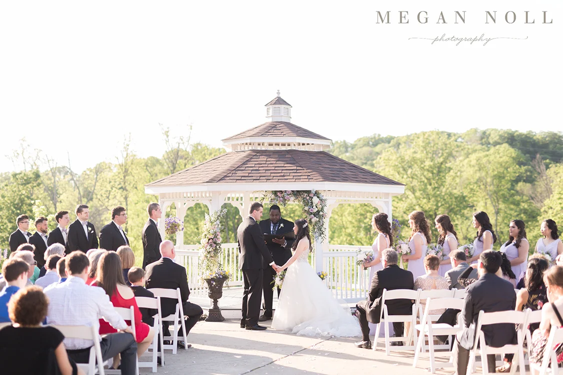 Wedding Ceremony at Aston Oaks Golf Club in North Bend, Ohio. Flowers by Floral Verde. Photo by Megan Noll Photography.
