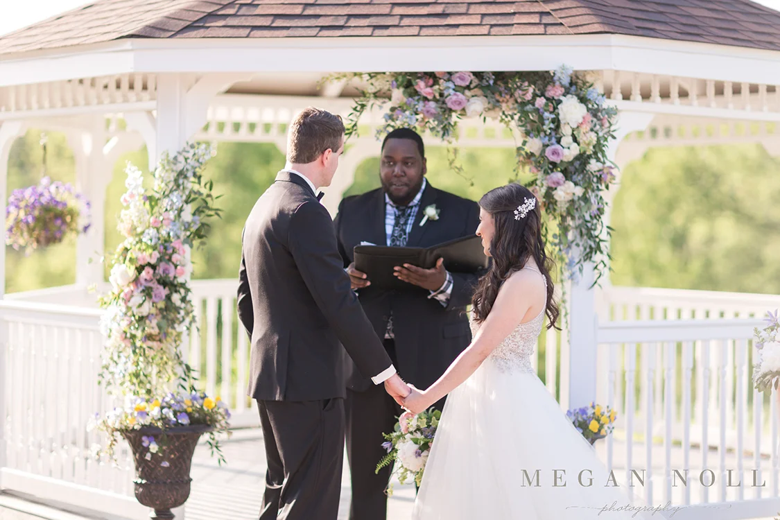 Wedding Ceremony at Aston Oaks Golf Club in North Bend, Ohio. Flowers by Floral Verde. Photo by Megan Noll Photography.