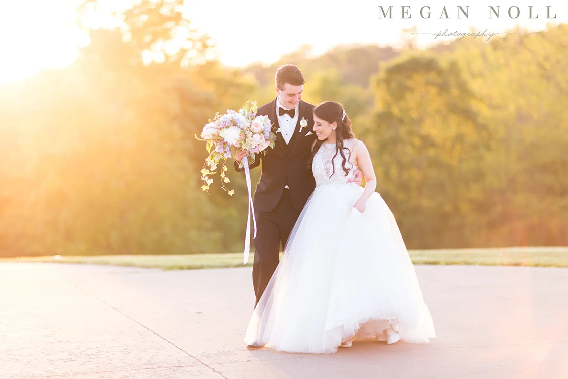 Wedding Ceremony at Aston Oaks Golf Club in North Bend, Ohio. Flowers by Floral Verde. Photo by Megan Noll Photography.