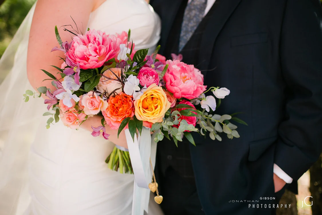 Wedding ceremony and reception at Wiedemann Hill Mansion in Newport, Kentucky. Flowers by Floral Verde. Photo by Jonathan Gibson Photography.