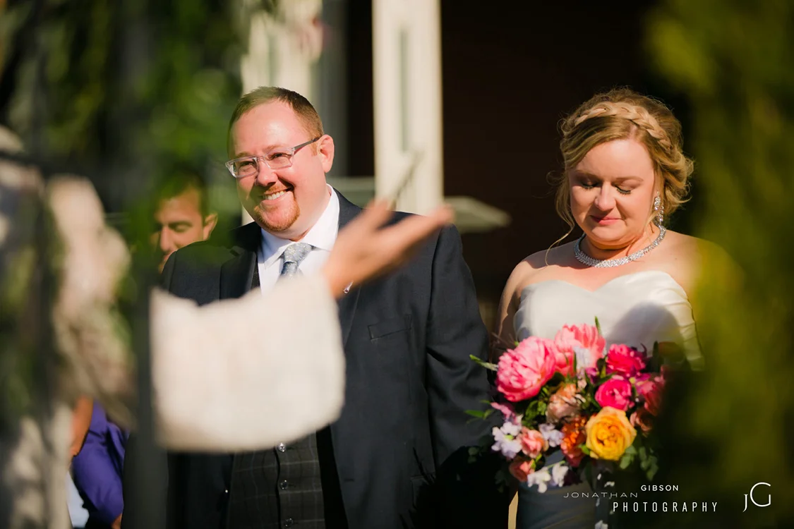 Wedding ceremony and reception at Wiedemann Hill Mansion in Newport, Kentucky. Flowers by Floral Verde. Photo by Jonathan Gibson Photography.