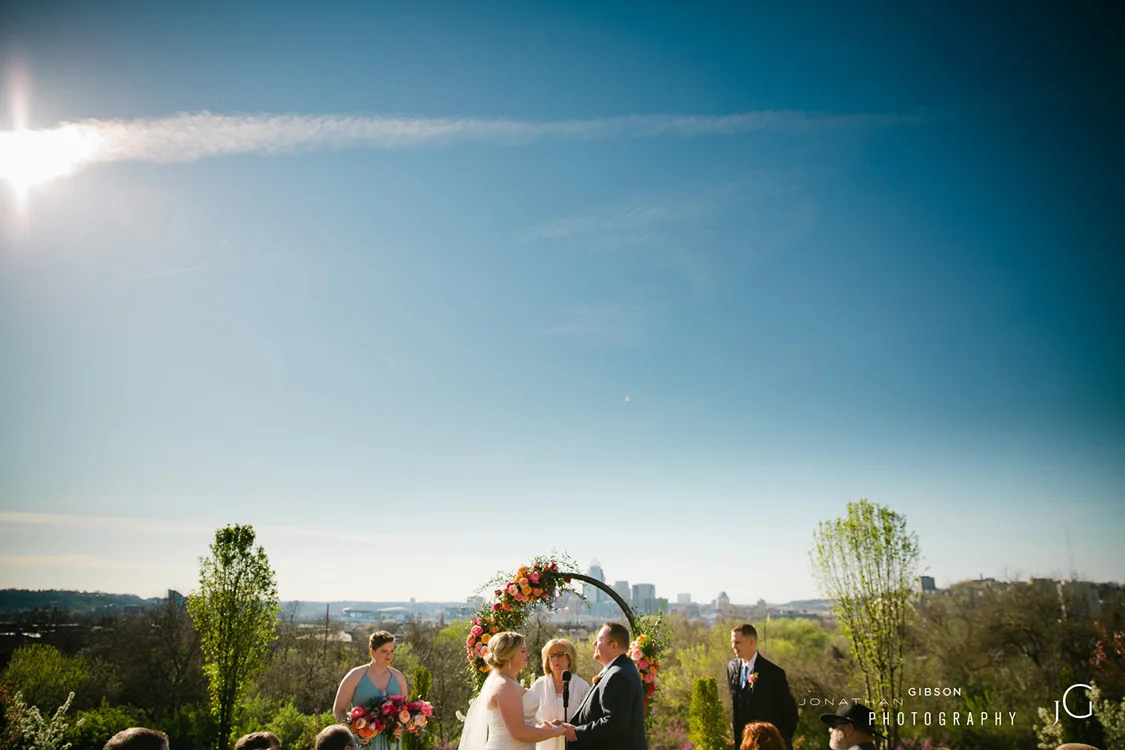 Wedding ceremony and reception at Wiedemann Hill Mansion in Newport, Kentucky. Flowers by Floral Verde. Photo by Jonathan Gibson Photography.