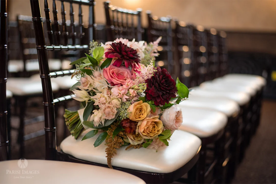 Wedding at The Monastery Event Center in Cincinnati, Ohio. Flowers by Floral Verde. Photo by Parisi Images.