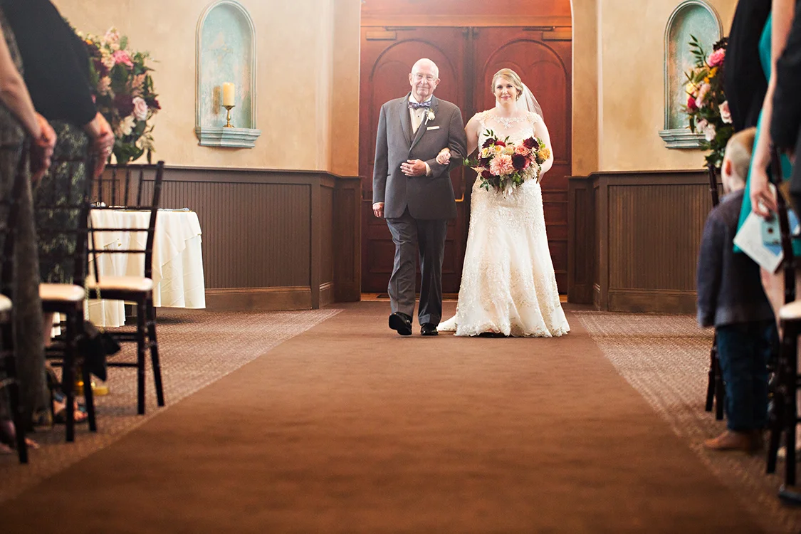 Wedding at The Monastery Event Center in Cincinnati, Ohio. Flowers by Floral Verde. Photo by Parisi Images.