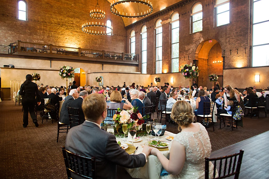 Wedding at The Monastery Event Center in Cincinnati, Ohio. Flowers by Floral Verde. Photo by Parisi Images.
