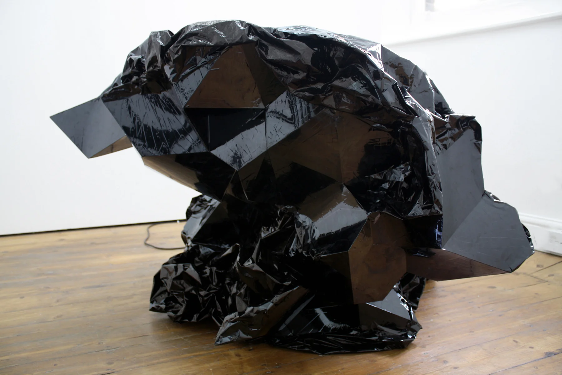 Curdle I , Mylar tape, plastic, aluminum, motor, 2009