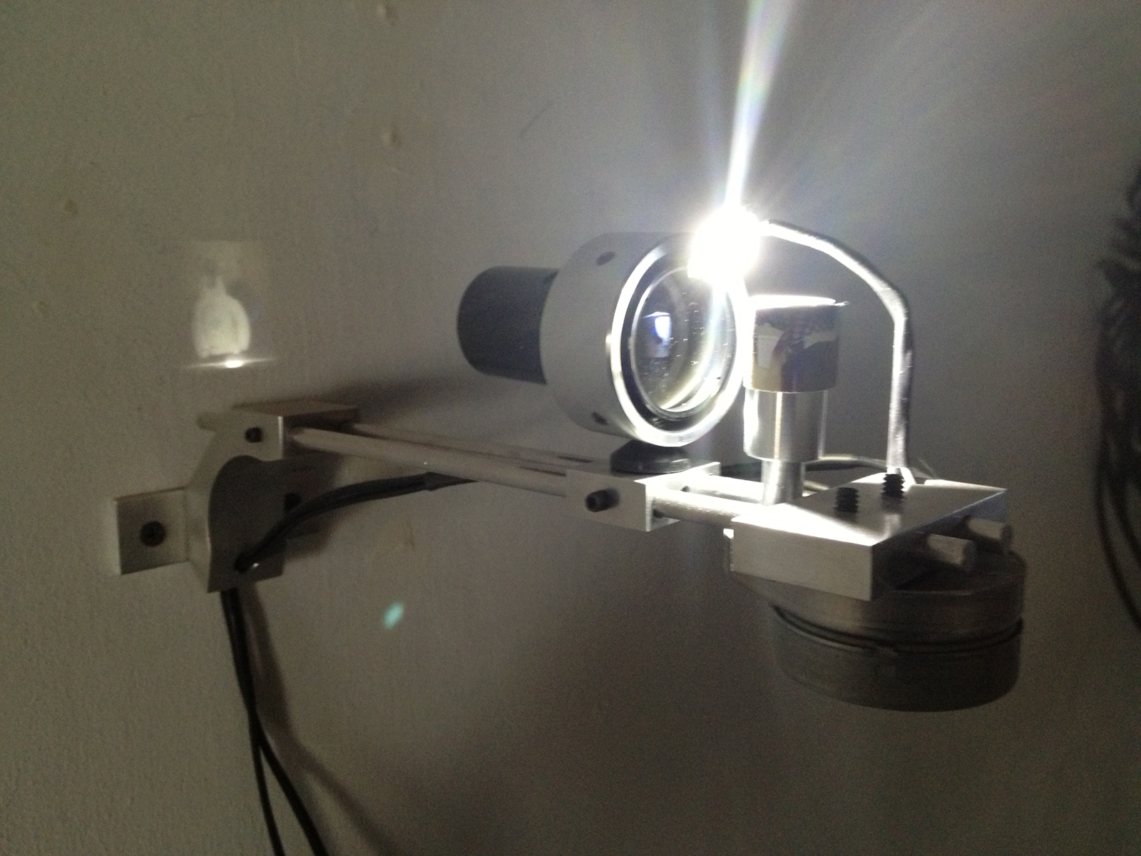   Something Very Small, the Center , Light, lens, photograph, motor, 2013 