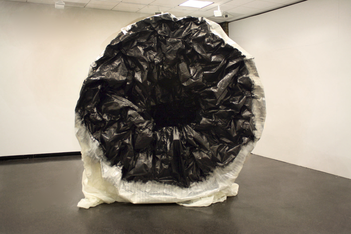   Cyclops , Mylar tape, plastic, aluminum, motor, 2009 