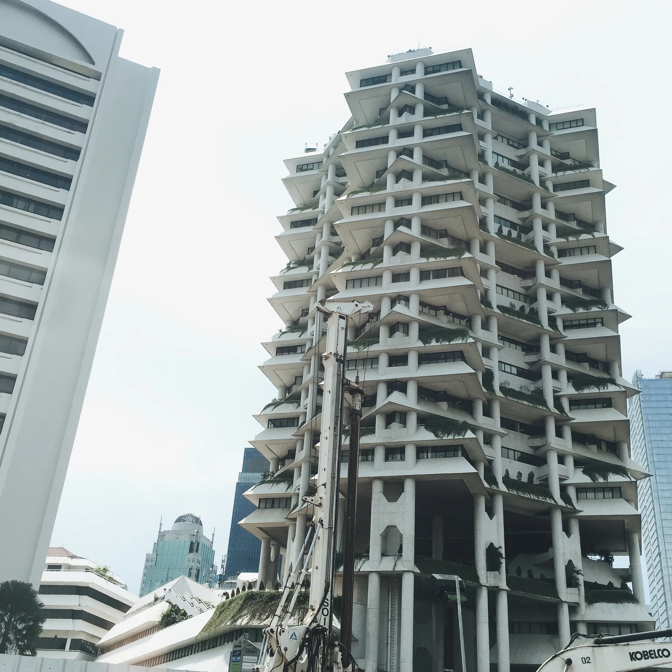 The Intiland Tower, designed by Paul Rudolph in 1986, as seen from my taxi while sitting in grid-lock traffic.