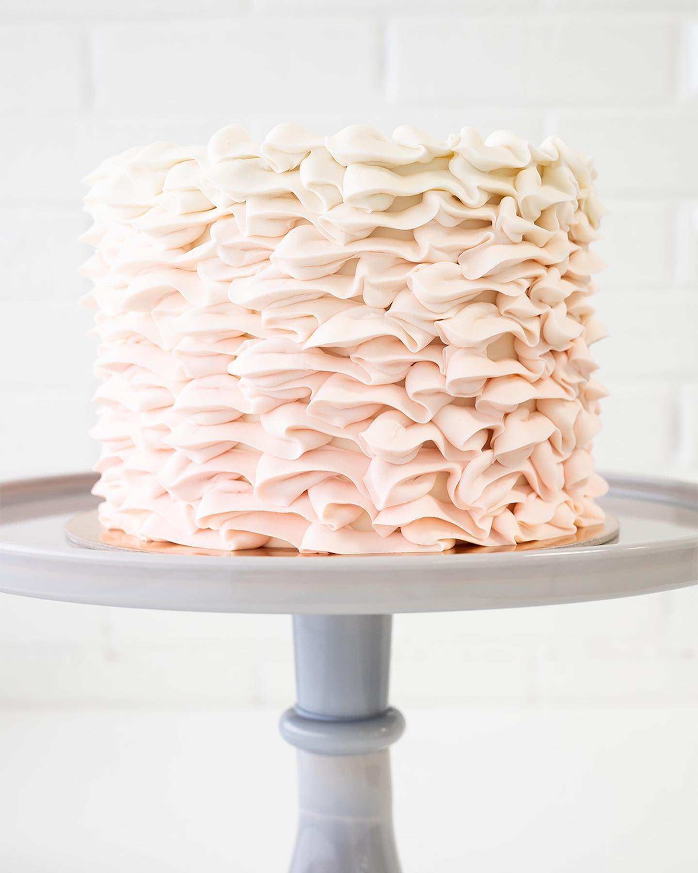 6&rdquo; Ruffle Cake in Blush-to-White ombr&eacute; with Blush icing message 🩷🤍🎂 See all our Made-to-Order Cake flavors, designs, and colors at the bio link.