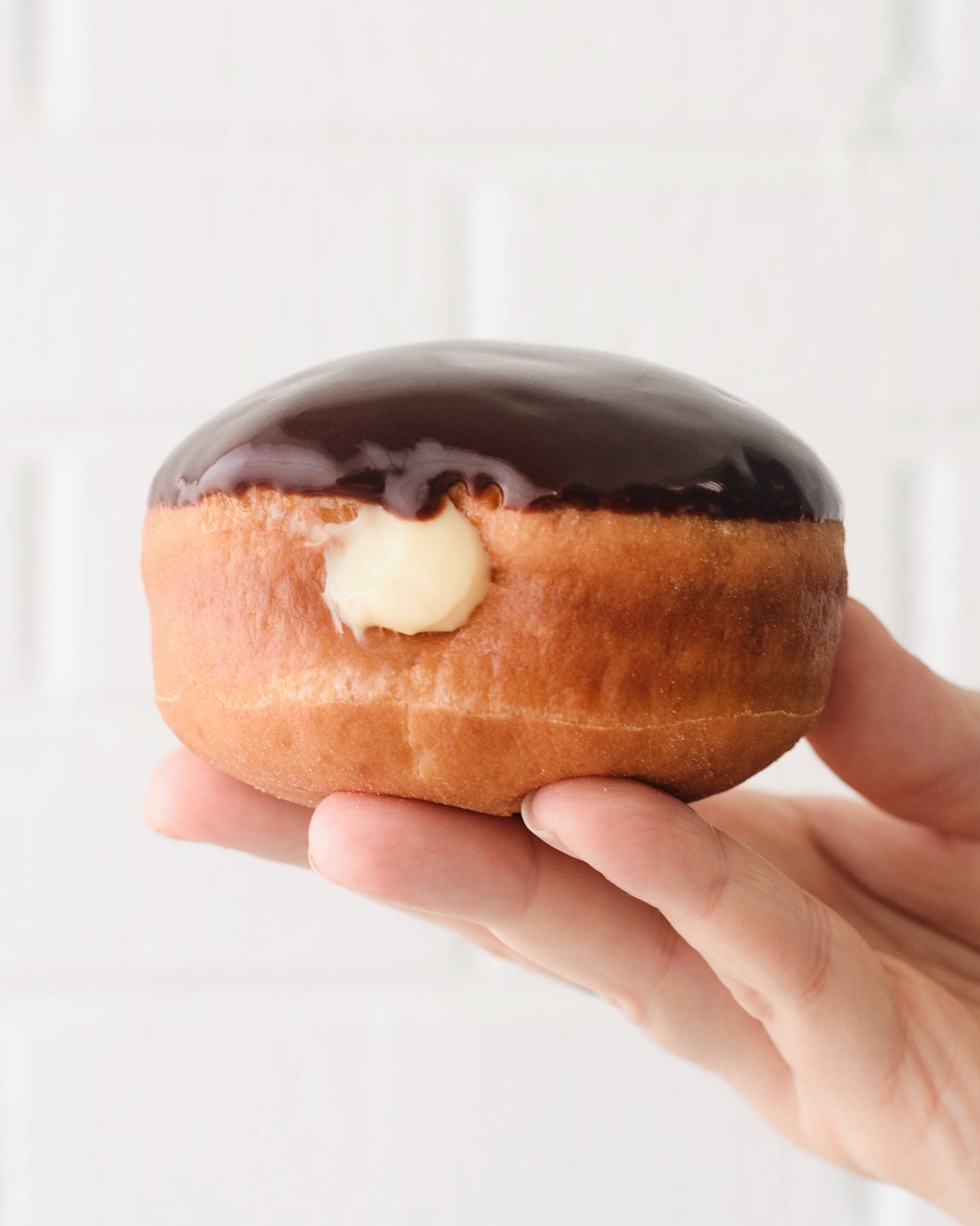 ICYMI&mdash;Boston Cream is back for May 🍫☁️🍩 Fluffy yeast doughnut, vanilla custard filling, and chocolate ganache. Here and @suarezbakeryandbarra till sold out every day this month.