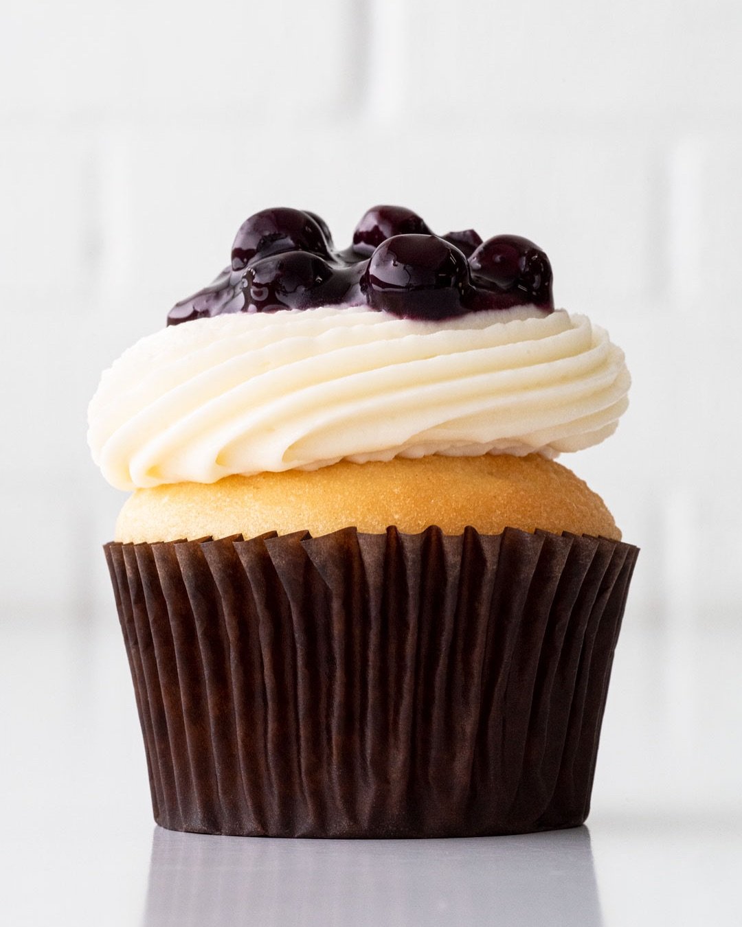 Lemon Blueberry is our newest cupcake of the month, and the tart &amp; sweet duo you didn&rsquo;t know you needed 🍋🫐🧁 Get these citrusy, berry-packed rebels with their lemon cake, blueberry custard filling, lemon cream cheese icing, and blueberry 