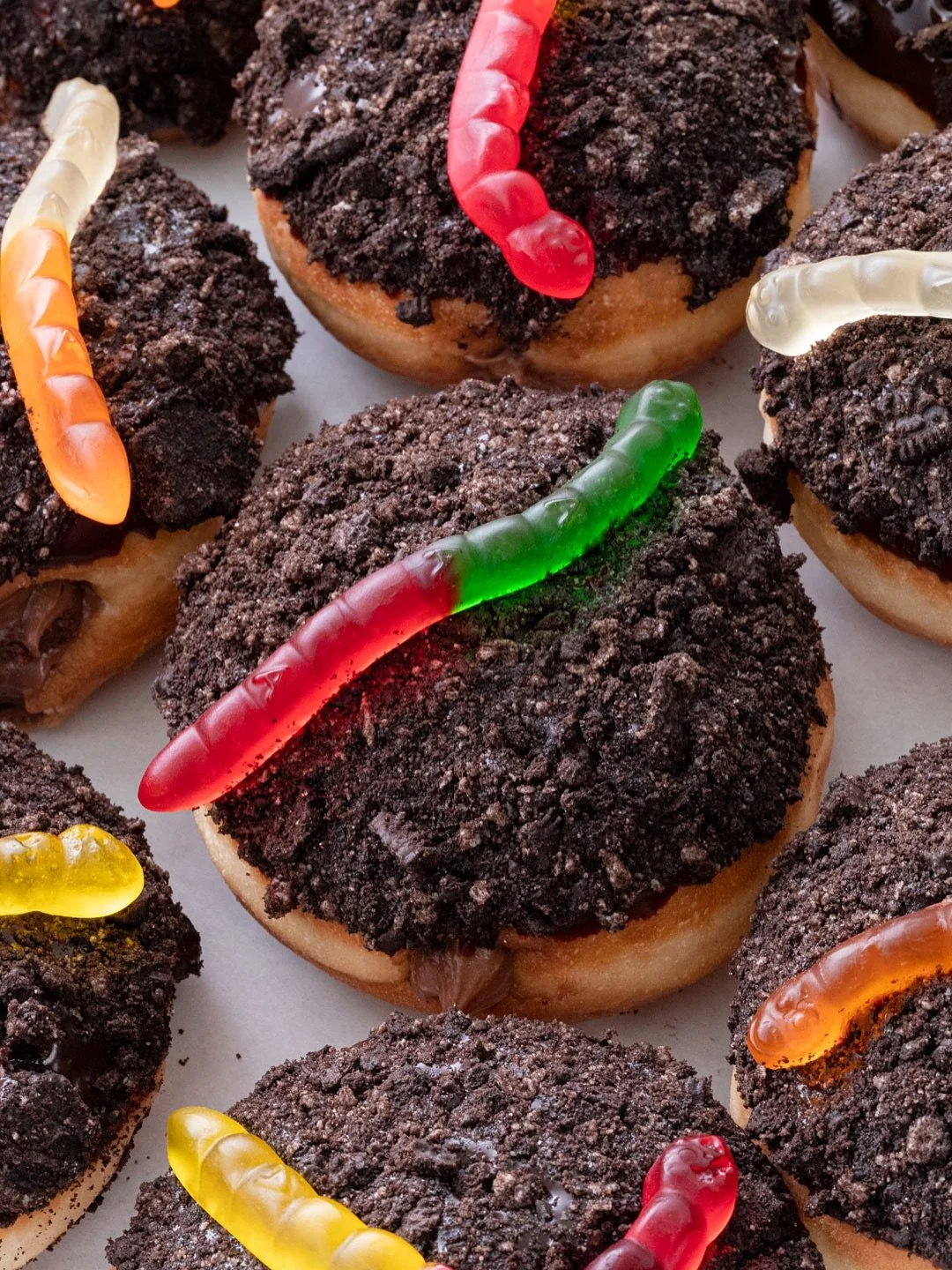 🍩 OCTOBER DOUGHNUT OF THE MONTH 🍩

🪱 Dirt (New!) 🪱

Fluffy yeast doughnut
Chocolate custard filling
Chocolate ganache
Crushed Oreo wafers
Gummy worm

Here and @suarezbakeryandbarra till sold out every day in October.