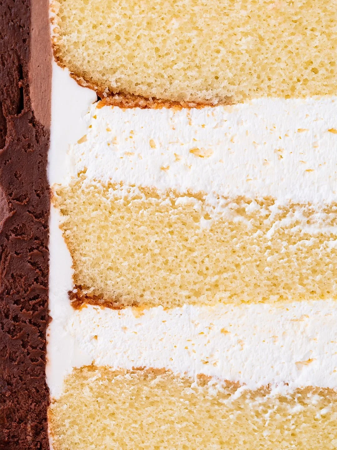 Yule Log Stump Cakes will be in the cold case tomorrow and Christmas Eve 🪵🎂🔥 Chocolate fudge frosting, chocolate buttercream top, buttercream holly leaves, meringue mushrooms, a dusting of powdered sugar, and either vanilla or chocolate cake and f