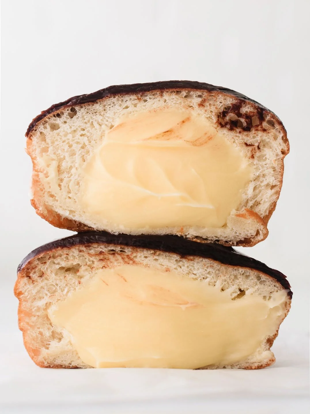 Boston Cream has officially joined the weekend rotation 🙌☁️🍫 Fluffy yeast outside, vanilla custard inside, chocolate ganache on top. Here till sold out every Fri&ndash;Sun for a limited time.

#charlotte #doughnuts #bostoncream