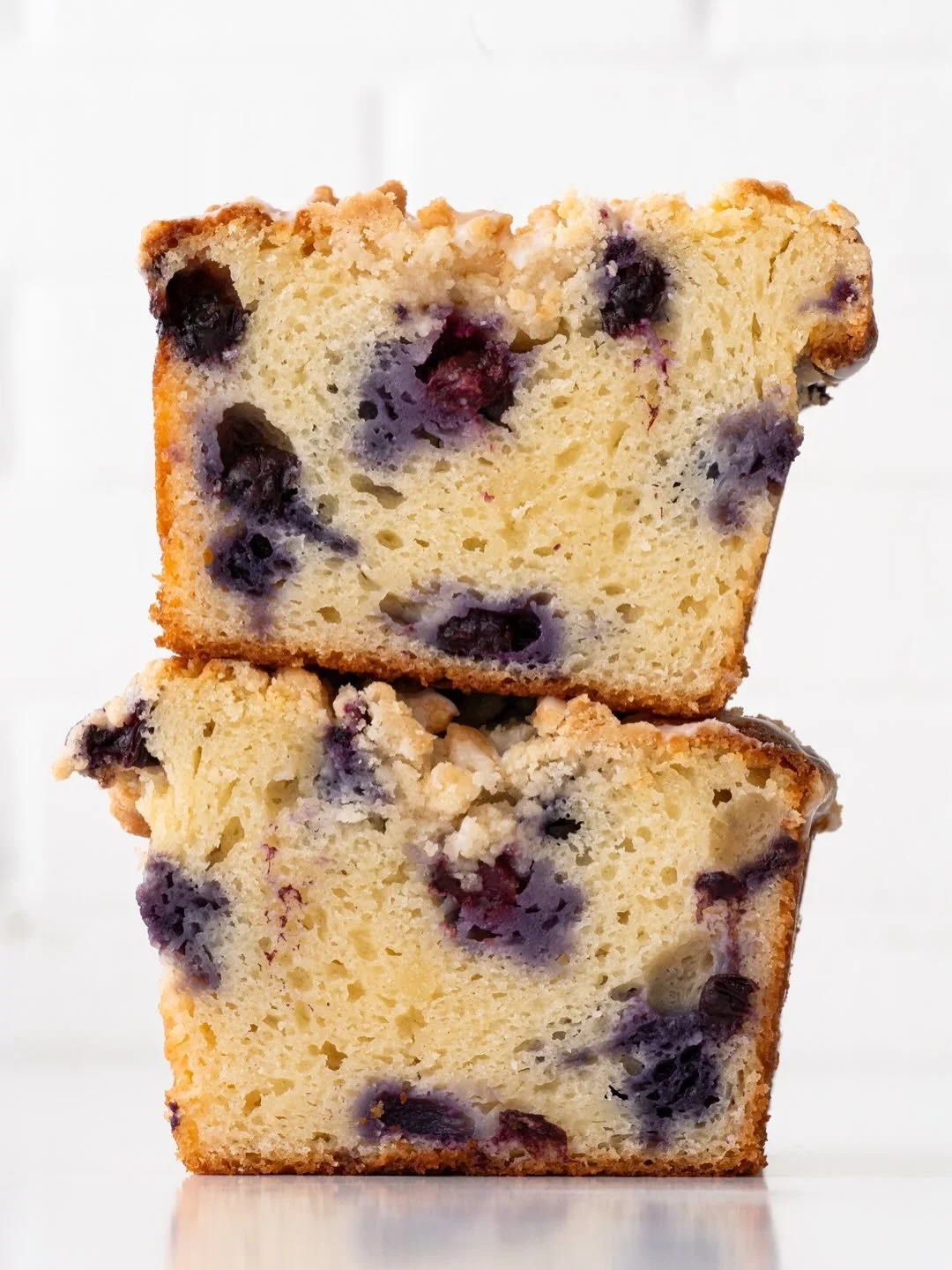 NEW LEMON BLUEBERRY BREAD IS HERE 🍋🫐🍞 Soft, bright, lemon quick bread loaded with blueberries and finished with butter crumble and a lemon glaze that cuts through everything in the best way. Slices are in store now; loaves are available for preord