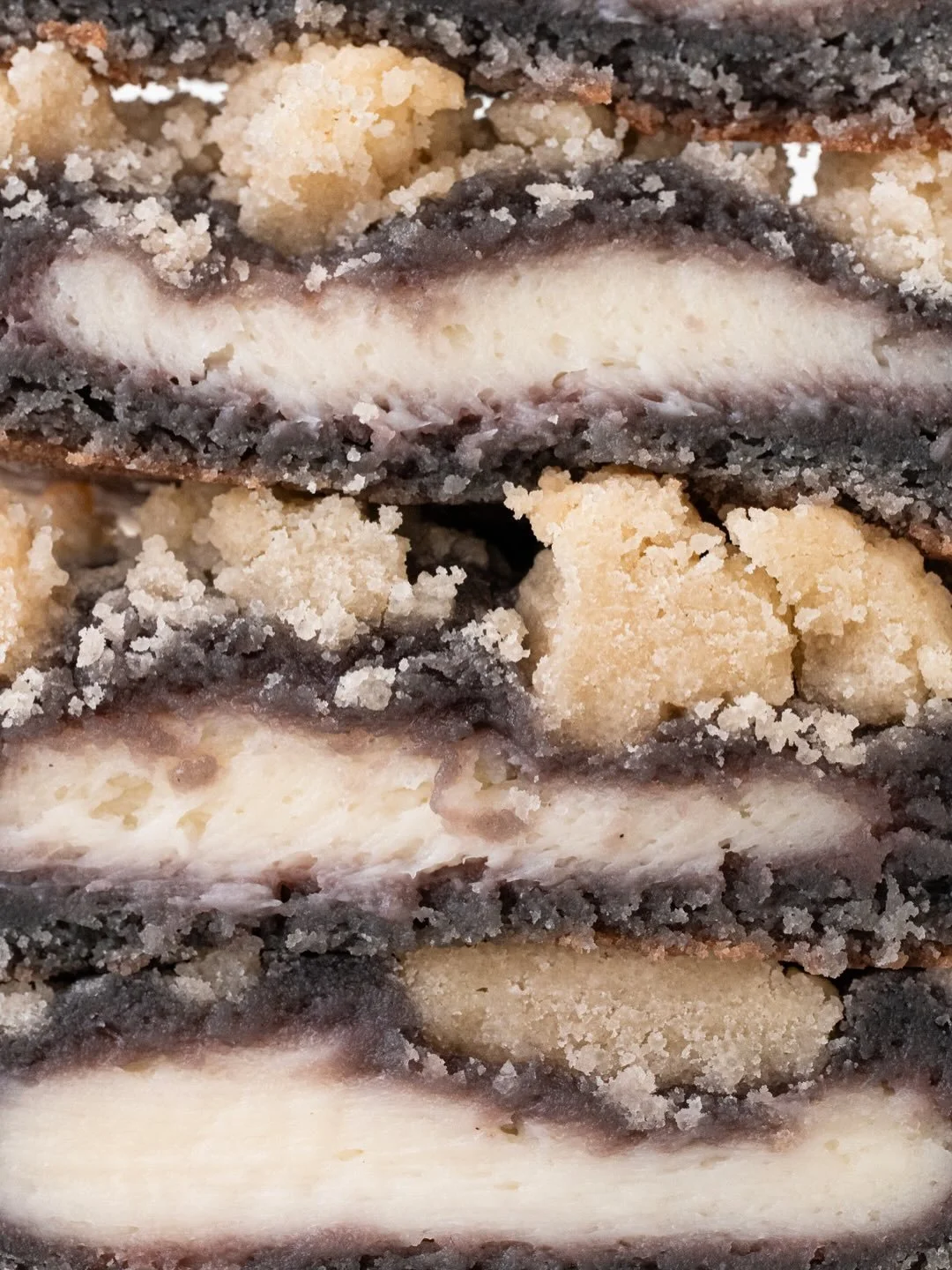 Blueberry Cheesecake, but make it a cookie and then absolutely overdo it 🫐🍰🍪 Soft blueberry cookie, cream cheese center, butter crumble on top. Stuffed Blueberry Cookies are still here, but only for a limited time. 

#charlotte #blueberry #cookies