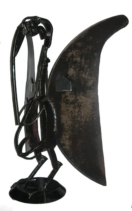 Senufu 3, 2010, steel with oil, 34"h x 26"w x 12"d