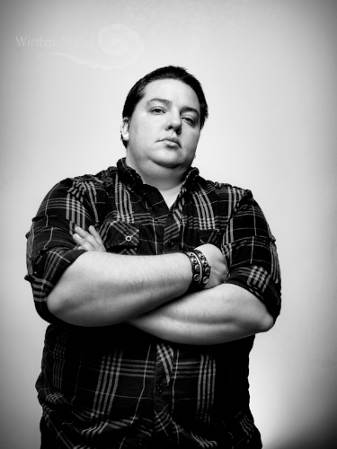 My gender journey had been a long one. At 36 years old, I am looking seriously at options for medical transition, having spent a number of years trying to feel out where the boundaries of my own gender expression lie. Because of my figure and my own somewhat convoluted expressions of gender dysphoria, binding and passing is something that I have never really been able to achieve (to my own satisfaction at least). For this reason, I have struggled with gender presentation, with feeling male while inhabiting a classically feminine hour glass shape. Because of this among other issues with how I look, I generally hate having my picture taken with a burning passion usually reserved for things like dentists or the IRS. I know that this did not make Winter's task any easier when it came to doing a photo shoot with me. That said, having images that I can look at even now and say 'yes, that is a man and that is me' has been one of the things that I have held onto while continuing to pursue what can be an incredibly invasive and potentially humiliating process so that one day hopefully I can look in the mirror and see the person I have in my head on the outside as well as on the inside.