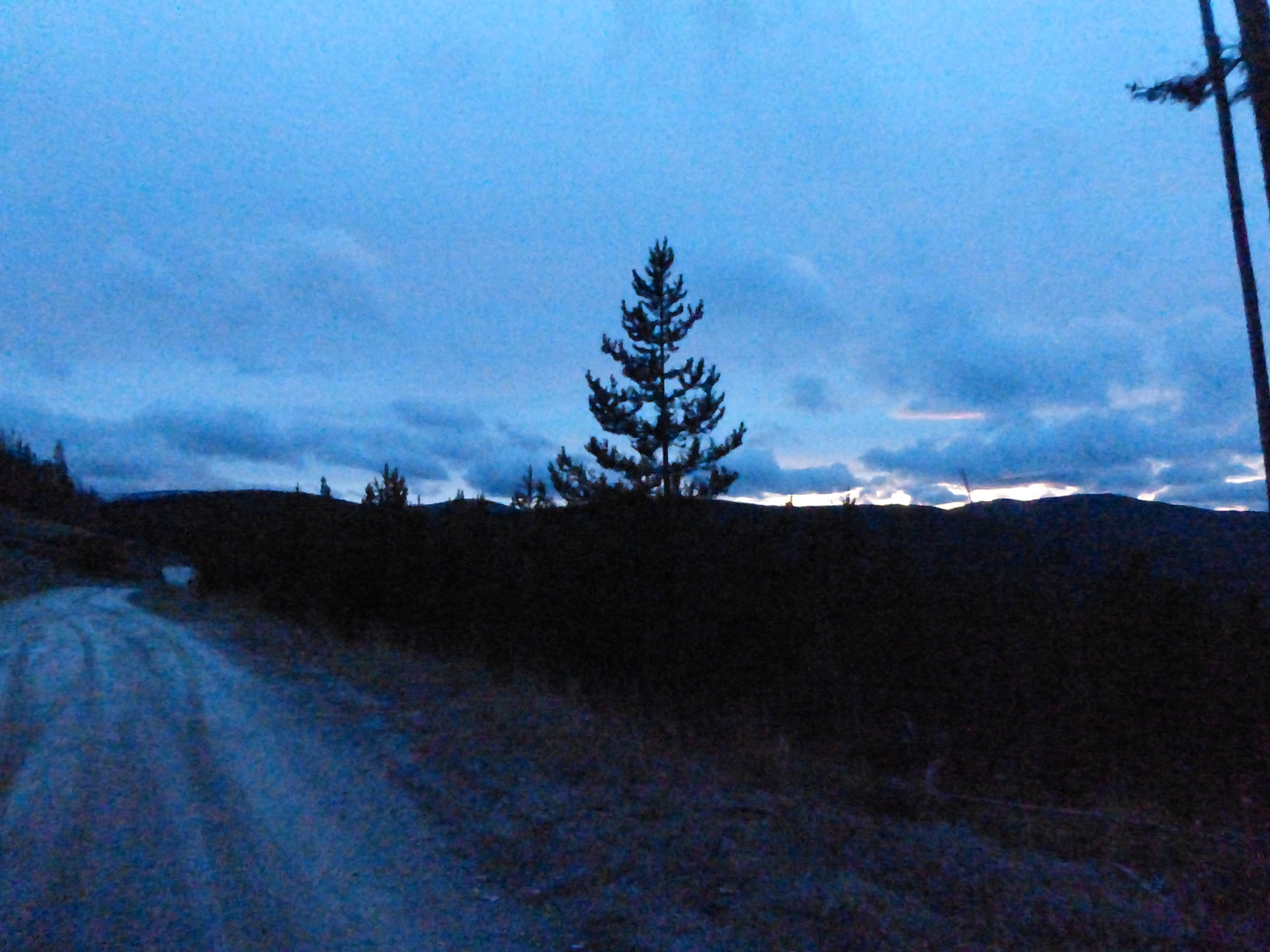 The fading daylight and the reminders of the sunset as I reached the top.
