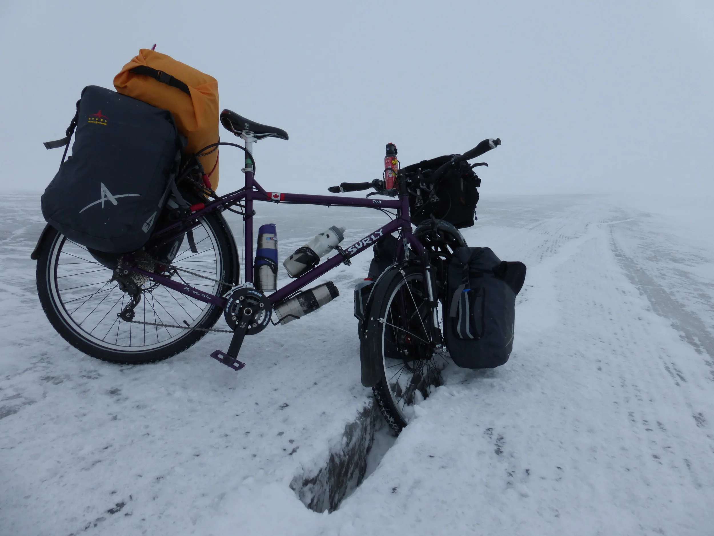 One of the biggest challenges was the ice road - at -20C 2 cracks ran along the road zig-zagging and I had to constantly cross them. I fell over 30 times in the two days I was there (landing on the overloaded panniers most of the time)