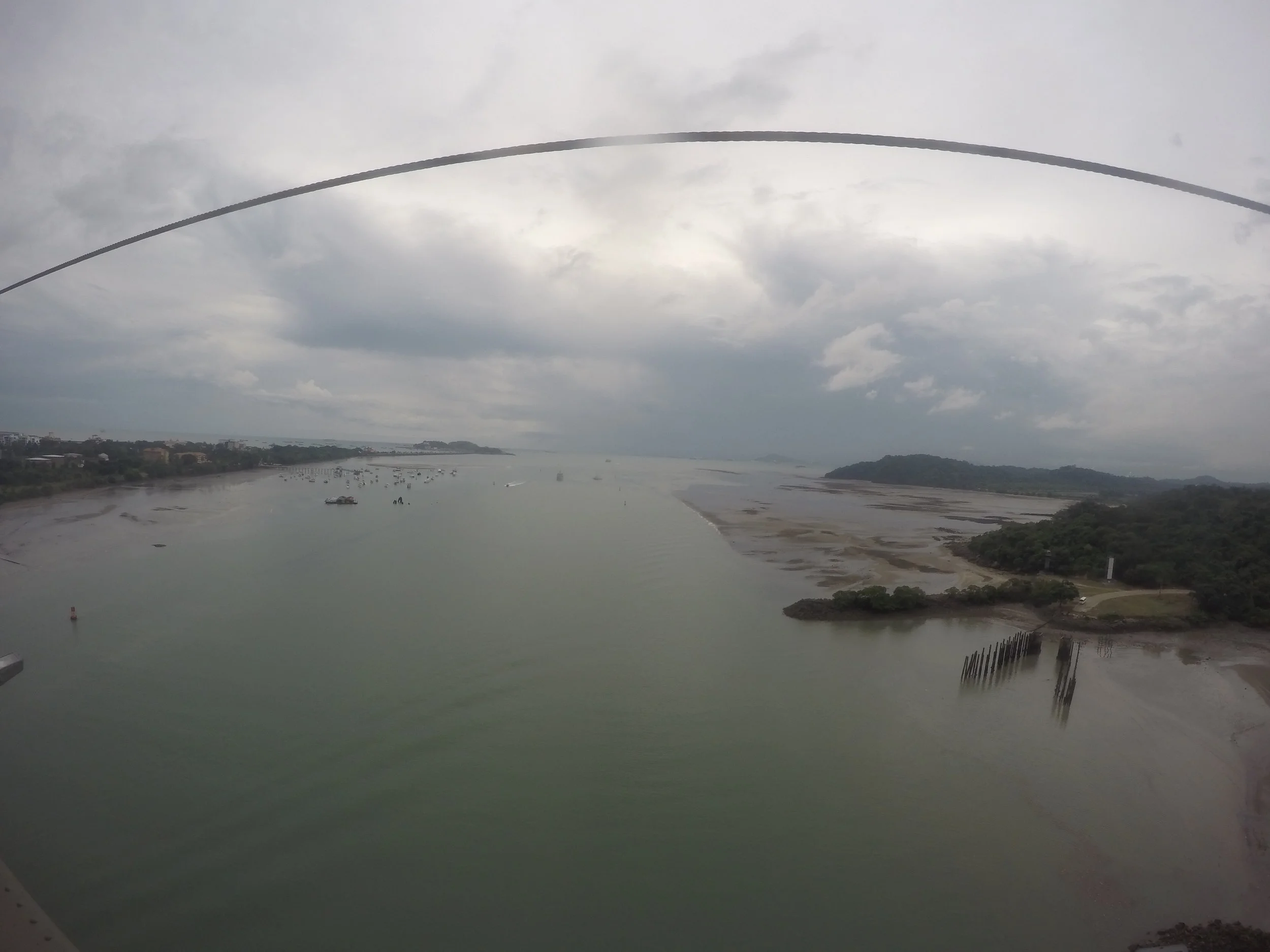 looking down on the Panama Canal, I thought about trying to cross on the other side but a cop honked at me and told me to keep going.