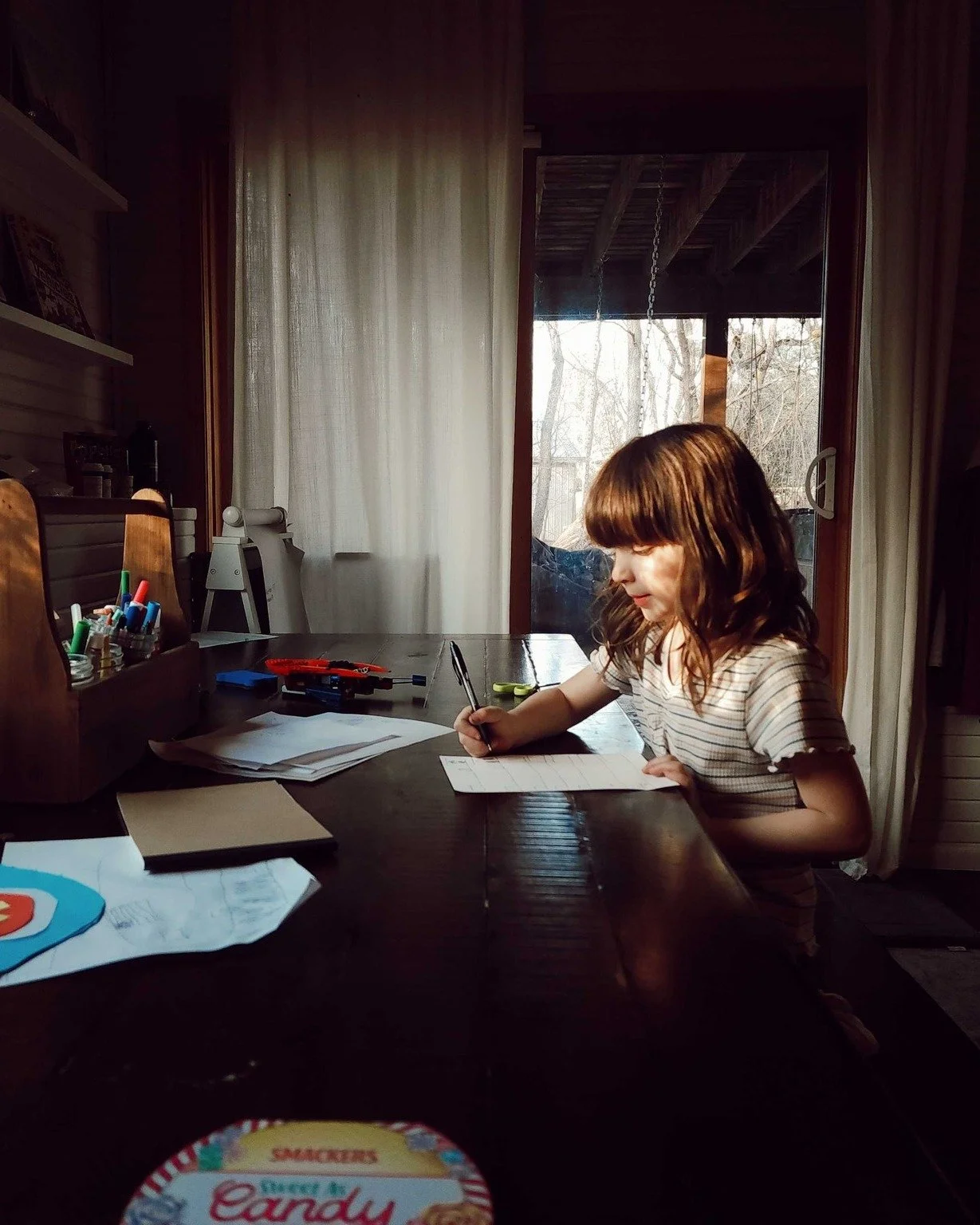 Baskets
Pajamas in piles from the morning rush,
a sticky toothbrush in the kitchen sink,
my hairbrush wound in tape,
magnet tiles littered with glitter gems,
—scattered across the floor.
A doctor’s stethoscope,
two pencils,
marbles roll